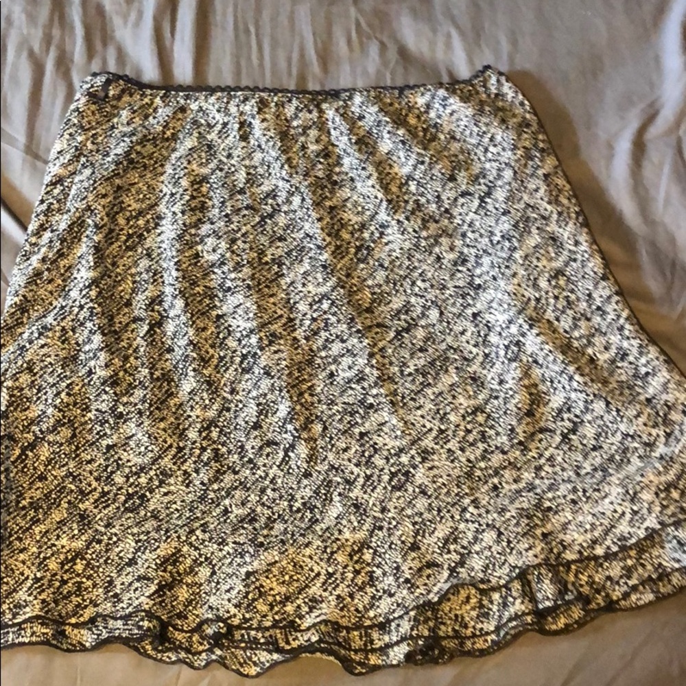 Black and white knee length skirt.